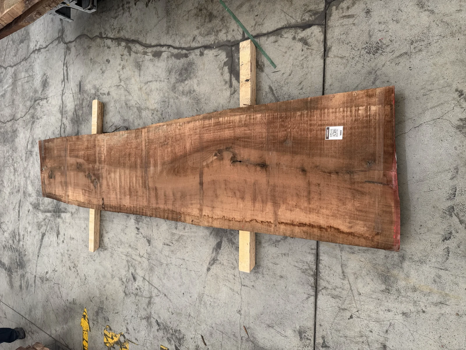 Full face of a kiln-dried European walnut slab showing straight grain